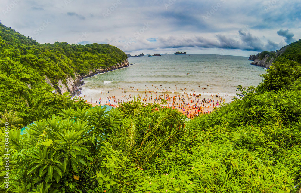 overcrowded beach in Cat Ba Island - it is a popular summer destination for Vietnamese tourists overcrowded beach in Cat Ba Island - it is a popular summer destination for Vietnamese tourists