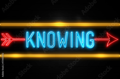Knowing  - fluorescent Neon Sign on brickwall Front view