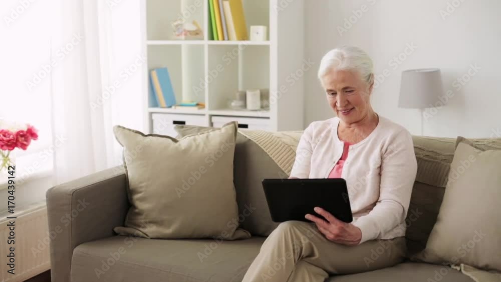 happy senior woman with tablet pc at home happy senior woman with tablet pc at home
