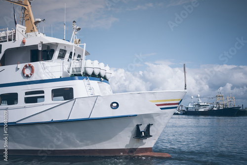 excursion boat in a harbor on the Island of Sylt, Germany under blue sky
