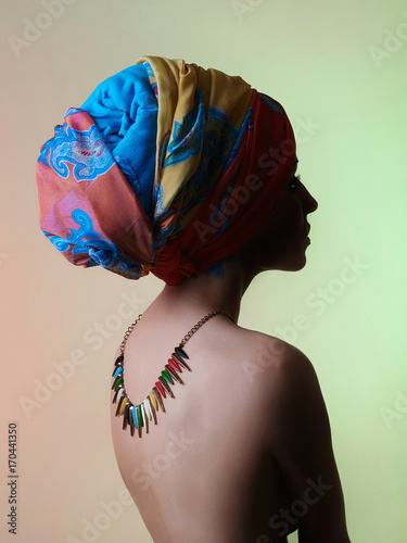 beautiful naked woman in turban © photoagents