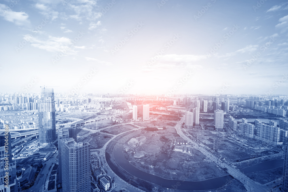 Fototapeta premium Aerial view of city buildings and river, China Nanchang