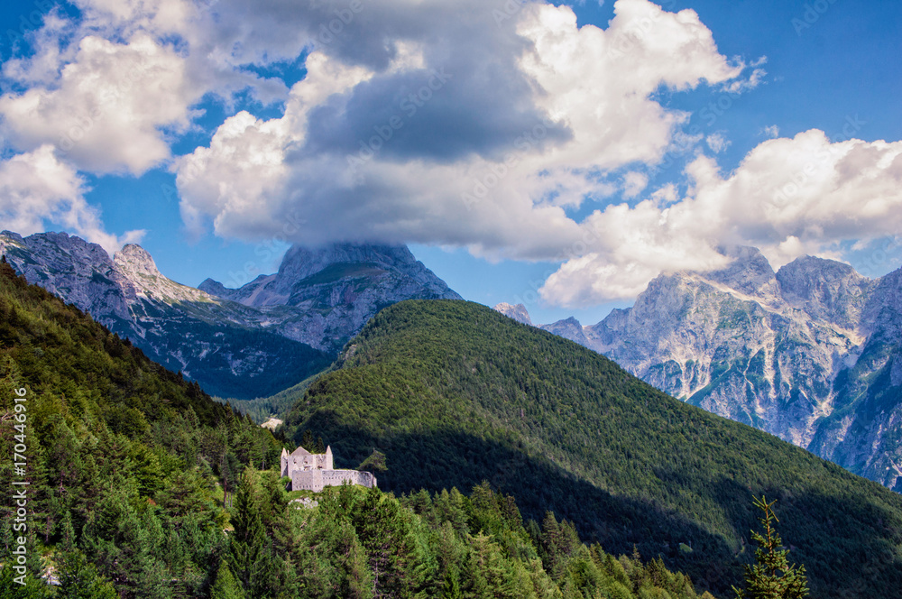 Ruins of Predel fort and Mt. Mangart in the background. Ruins of Predel fort and Mt. Mangart in the background.