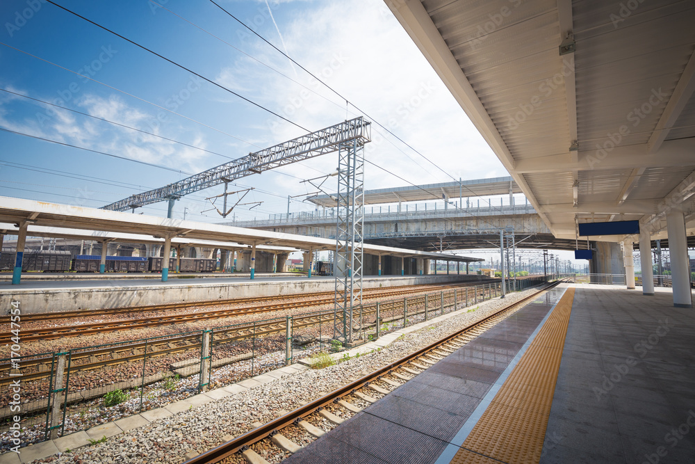 Modern high speed train at the railway station with motion blur effect Modern high speed train at the railway station with motion blur effect