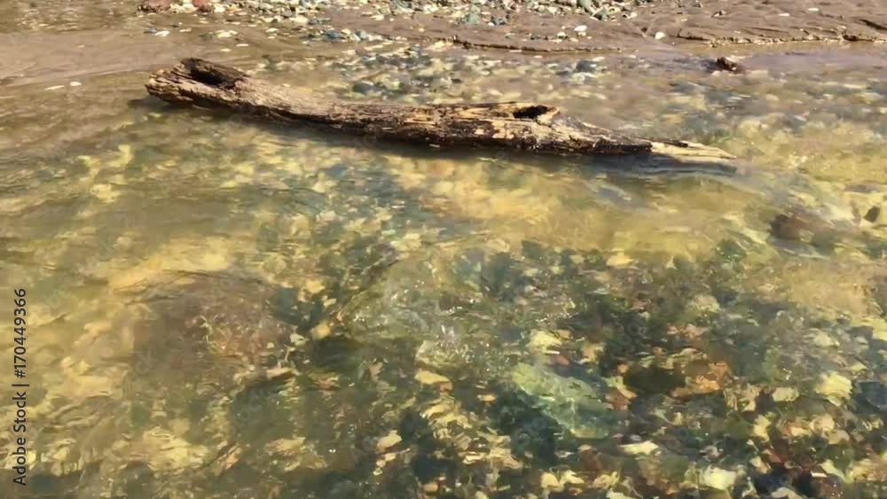 Slow motion of flow of water stream current. Nature background Slow motion of flow of water stream current. Nature background