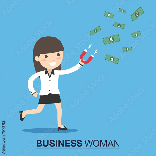 Business woman attracts money with a large magnet