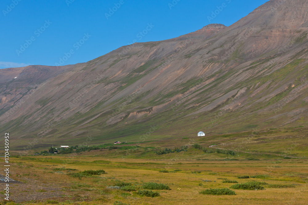 Mountains landscape with Icelandic Houses