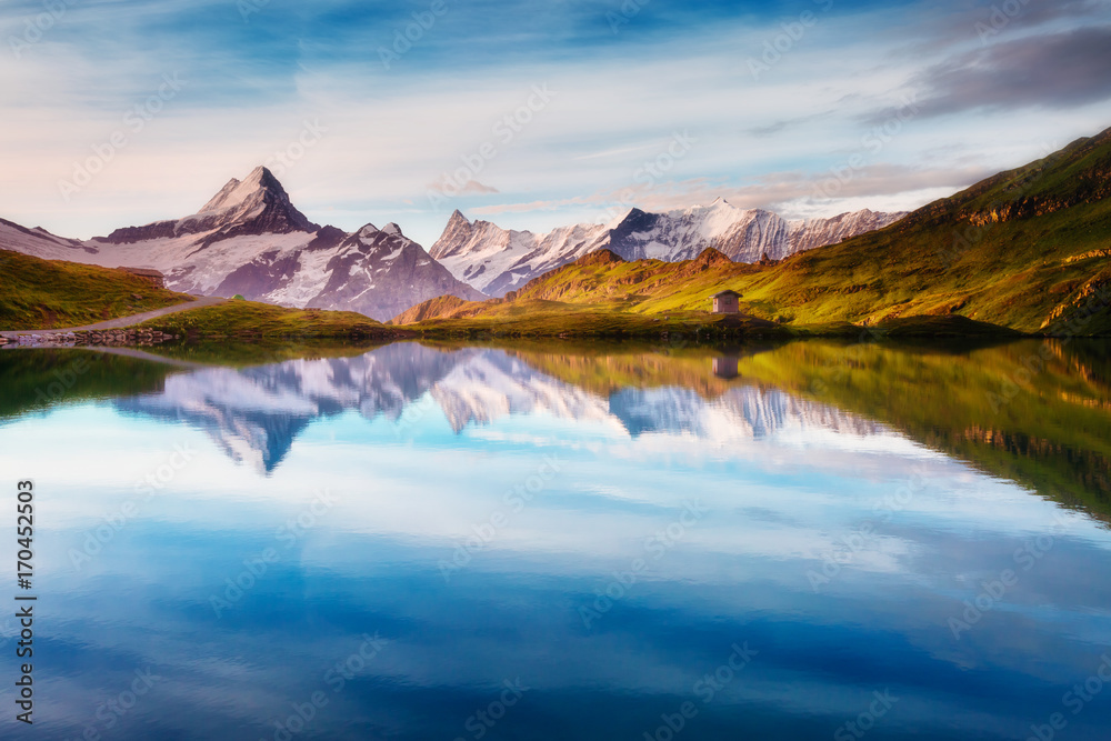 Panorama of Mt. Schreckhorn and Wetterhorn. Location place Bachalpsee in Swiss alps, Grindelwald, Europe.