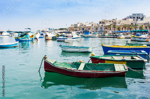 Traditional boats at Marsaxlokk Harbor in Malta © ilolab