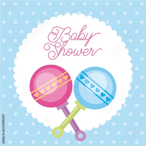 Foto baby shower card greeting with rattler toy dots background vector illustration