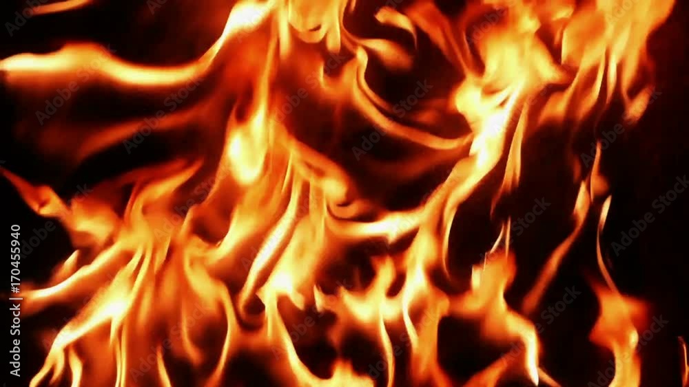 Flames on a sheet of rusty metal