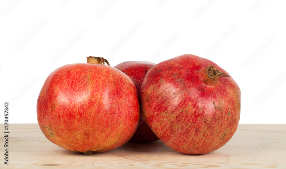Fresh ripe pomegranate isolated on white background Fresh ripe pomegranate isolated on white background