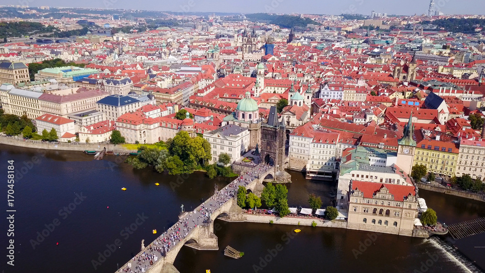 Prague, Czech Republic - Beautiful summer’s day over the city, including Charles Bridge and Prague one municipal district 