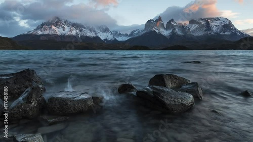 Time Lapse. Fantastic dawn in Torres del Paine, Patagonia, Chile, over Lago Pehoe - Southern Patagonian Ice Field, Magellanes Region of South America. photo