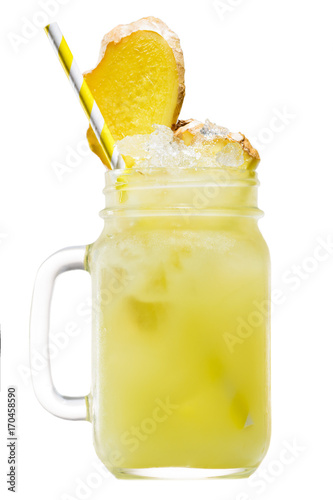 Fresh tropical yellow pineapple smoothie in a mason jar with yellow straw decorated with slice of pineapple, isolated on white background