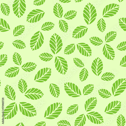 Seamless pattern with green strawberry leaves