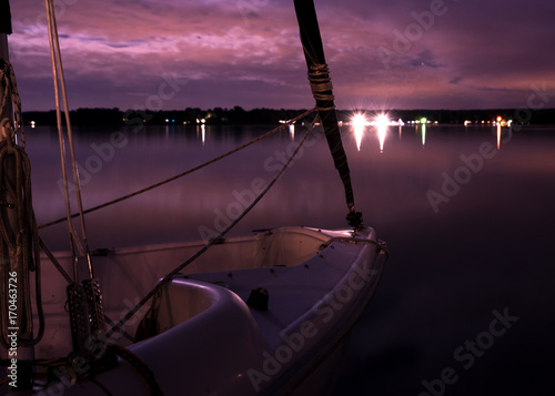 purple boat at night 