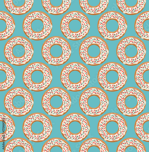 Vector seamless pattern with glazed white chocolate donuts on blue background