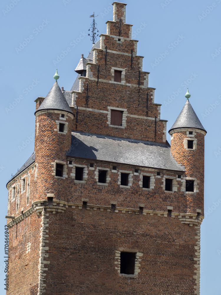 The close up of a castle tower.