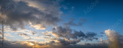 Panorama view of sky and cloud during sunset with dramatic sky background © sirintra