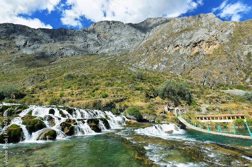 Clear waters of Canete river in Huancaya village, Peru photo