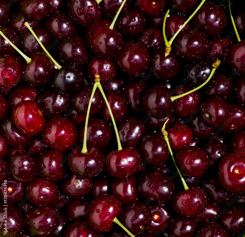 Freshly red cherry berries with water droplets. Healthy food background Freshly red cherry berries with water droplets. Healthy food background