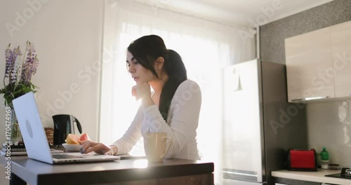 Young Woman Work On Laptop Computer Typing Sitting At Table At Home Beautiful Girl Browsing Internet In Morning Indoors Slow Motion 60