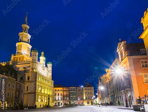 Beautifully illuminated Poznan's Old Town with historic city hall.