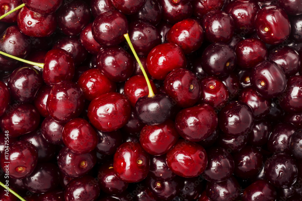 Freshly red cherry berries with water droplets. Healthy food background Freshly red cherry berries with water droplets. Healthy food background