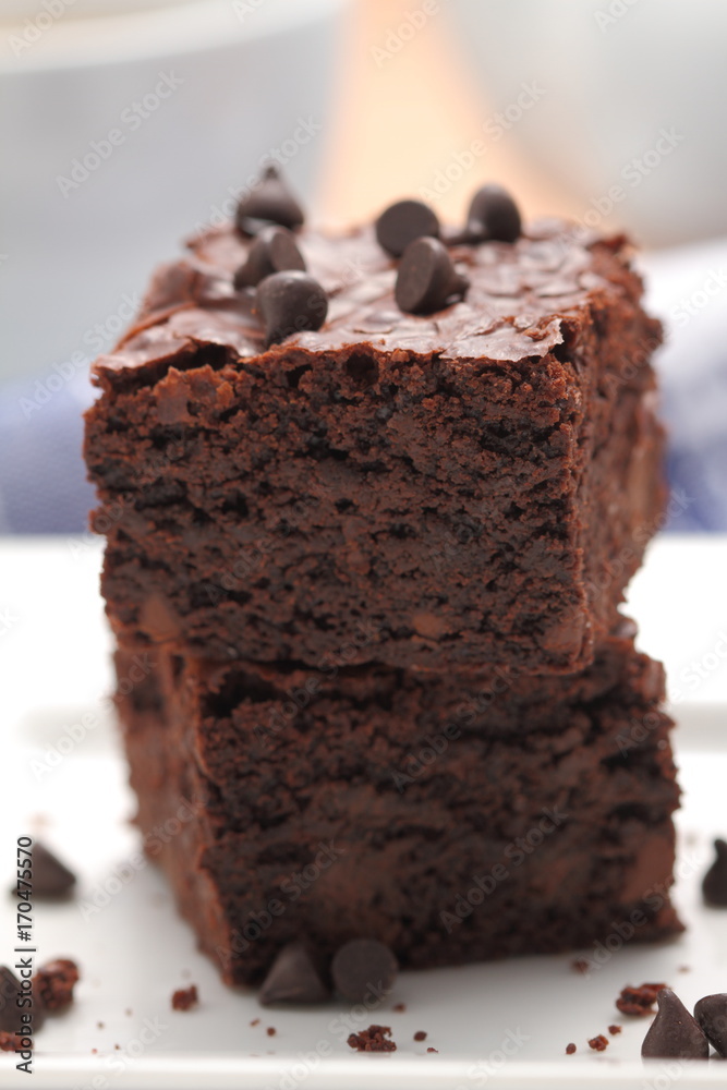 Homemade chocolate brownies served on a plate Homemade chocolate brownies served on a plate