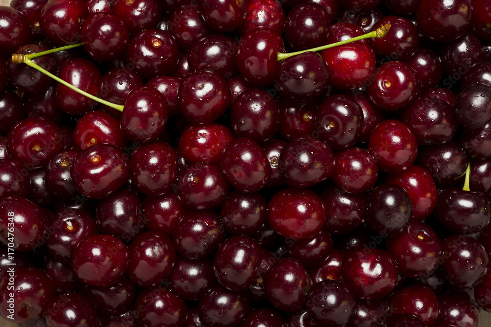 Freshly red cherry berries with water droplets. Healthy food background Freshly red cherry berries with water droplets. Healthy food background
