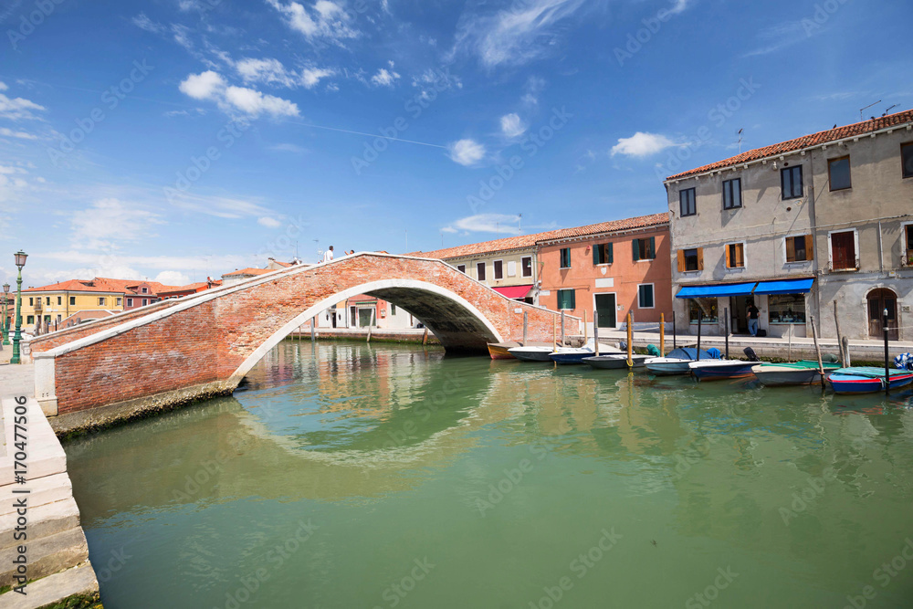 Murano Island, small village near the Venice / Panorama of the river canal and historical architecture.