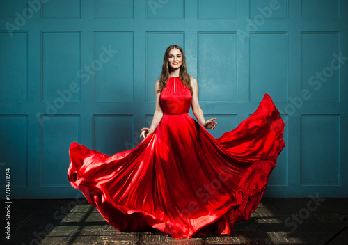 Pretty Woman Fashion Model on Blue Background