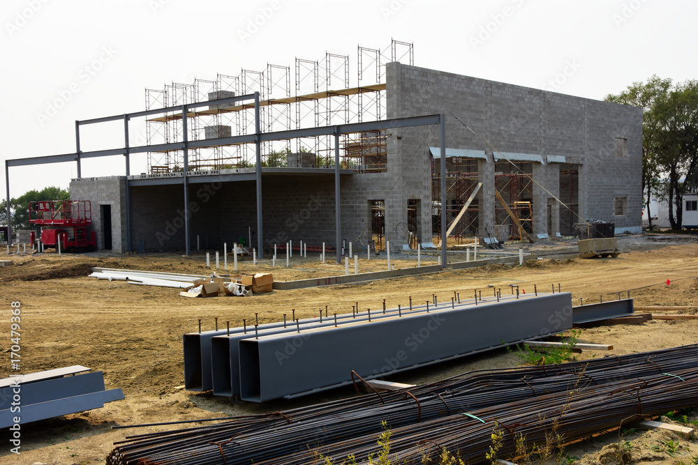 Fototapeta premium Commercial concrete block building under construction.