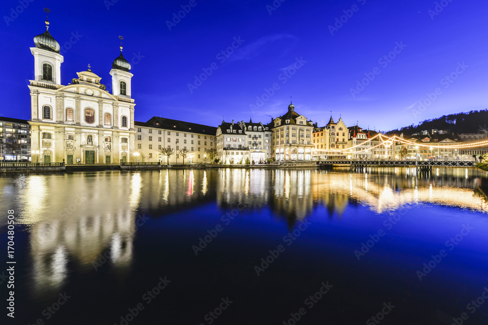 Luzern with christmas lights reflected in the water