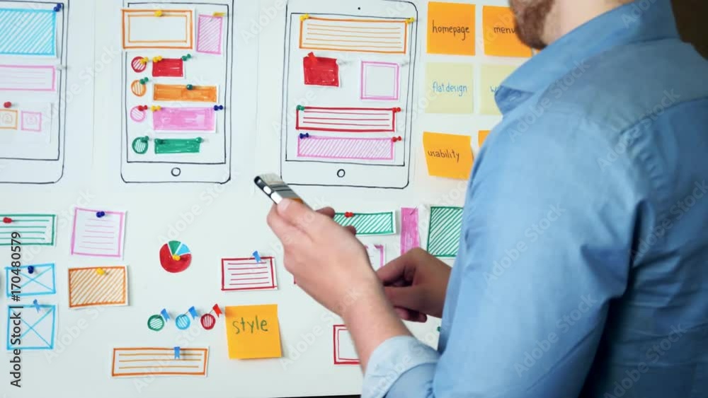 Creative UX designer doing usability research for mobile application
