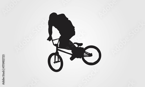 Cyclist rider bmx performs trick jump logo silhouette vector © Alghaisani