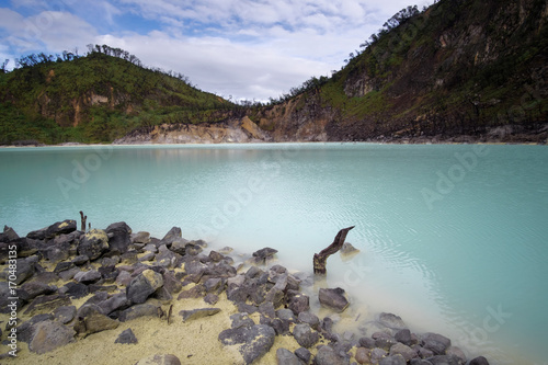 Kawah Putih - ancient volcanic crater with three colored water, similar to famous Kelimutu Volcano , West Java, Indonesia photo