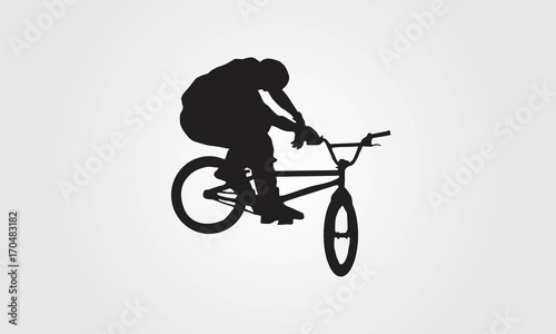 Cyclist rider bmx performs trick jump logo silhouette vector