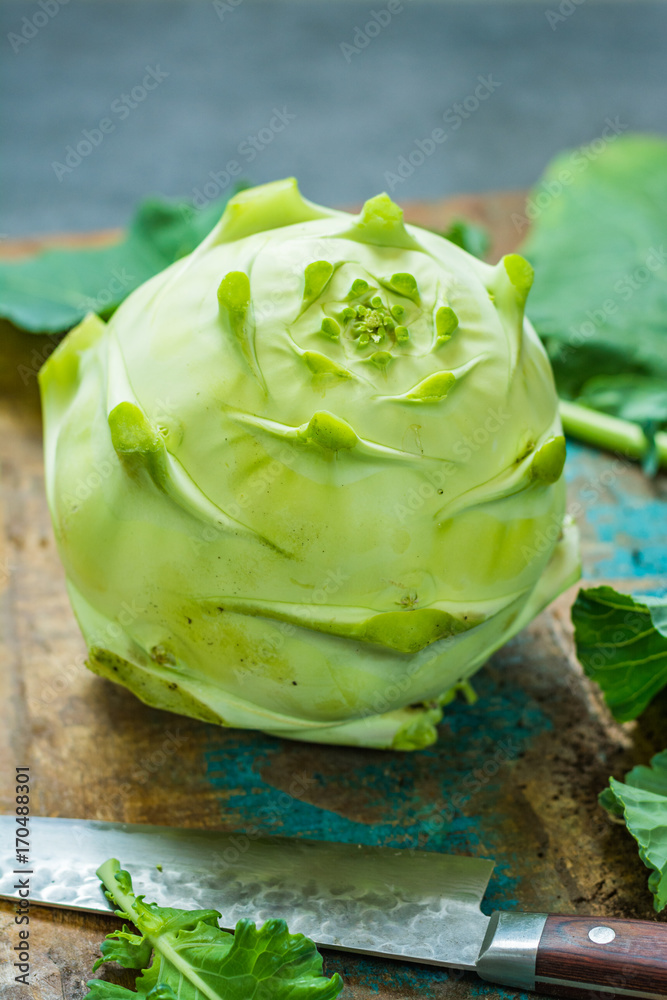 Fresh green kohlrabi with green leaves ready to eat