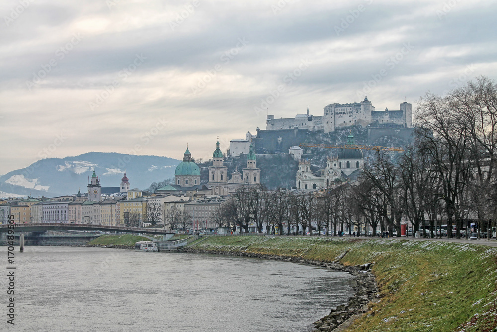 View of Salzburg with Salzach river in winter, Austria