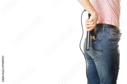 Young girl curling iron for straightening hair 