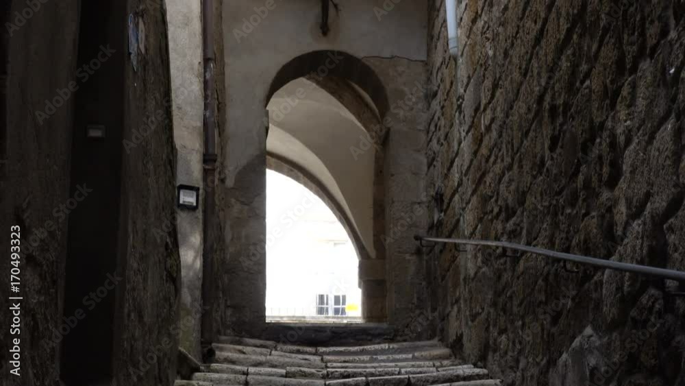 view of empty old italian street of small town with the staircase
view of empty old italian street of small town with the staircase