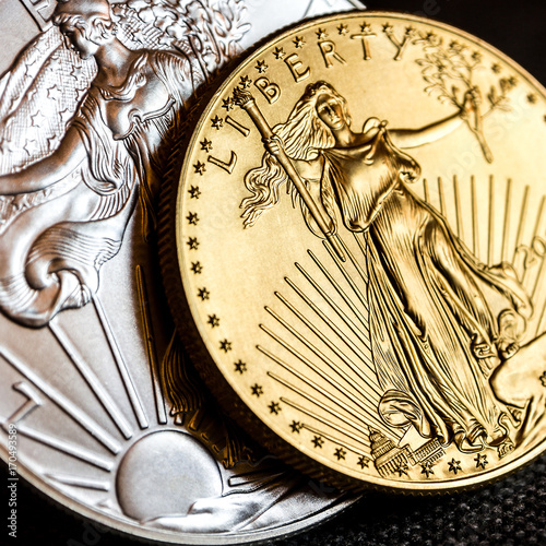 silver eagle and golden american eagle one ounce coins