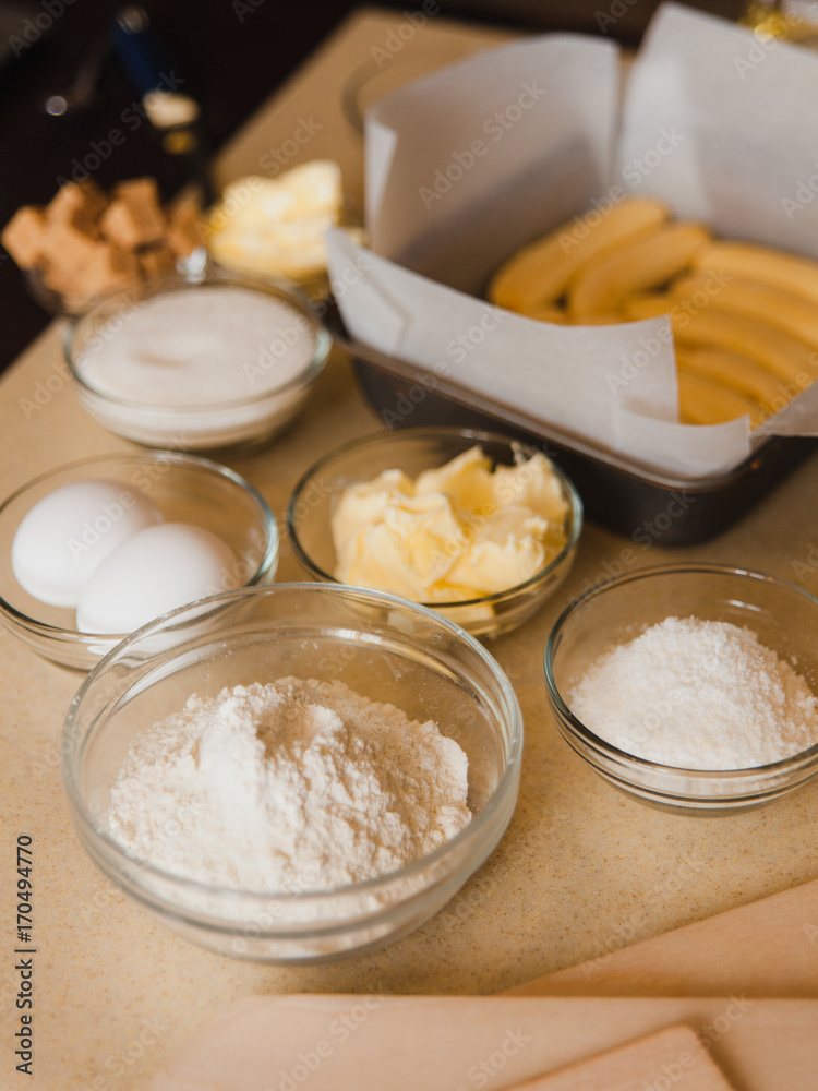 Cooking process on kitchen. Ingredients for sweet fruit dessert on table. Cooking process on kitchen. Ingredients for sweet fruit dessert on table.