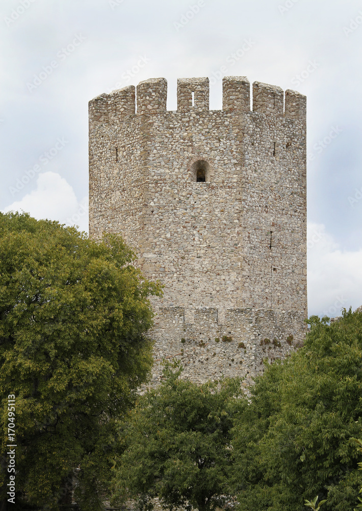 Ancient hexagonal stone tower, a viewpoint and a loophole, from Greece.