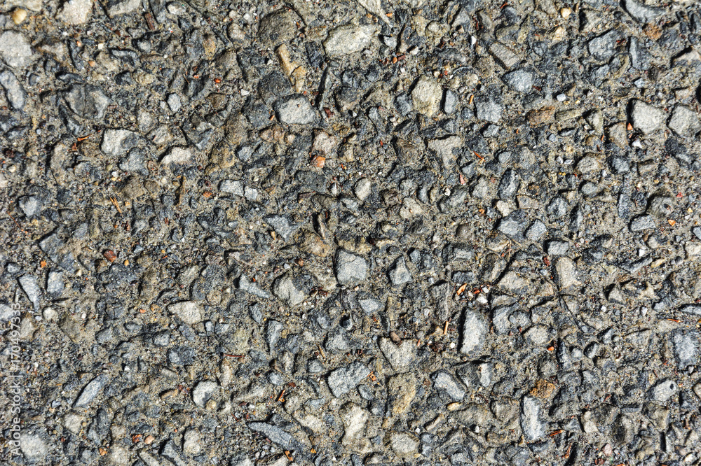 The texture of asphalt with large stones The texture of asphalt with large stones