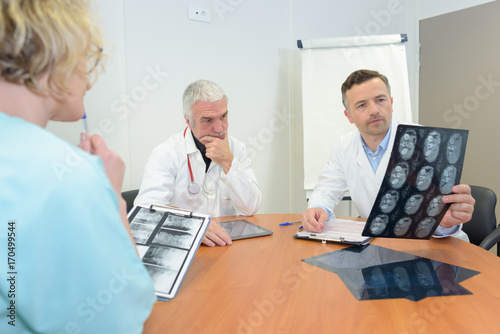 doctors looking at x-ray © auremar