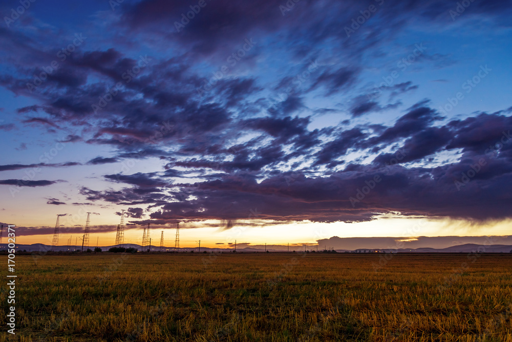 Dramatic sunset over a field