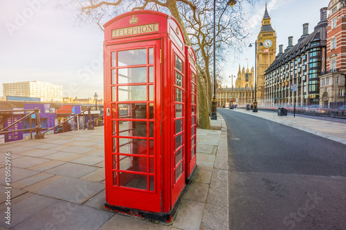 London  England - Traditional British red telephone box at Victoria Embankment with Big Ben at background